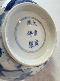 A Chinese blue and white bowl with scholars among cranes and deer, Kangxi mark and of the period