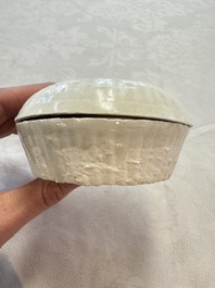 Four Chinese white-glazed boxes and covers with incised floral design from the Jepara shipwreck, Dehua or Anxi kiln, Song