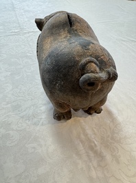 A Javanese terracotta boar-shaped money bank, probably Majapahit Kingdom, 15th C.