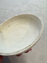 Four Chinese white-glazed boxes and covers with incised floral design from the Jepara shipwreck, Dehua or Anxi kiln, Song