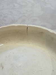 Four Chinese white-glazed boxes and covers with incised floral design from the Jepara shipwreck, Dehua or Anxi kiln, Song