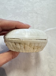 Four Chinese white-glazed boxes and covers with incised floral design from the Jepara shipwreck, Dehua or Anxi kiln, Song