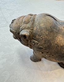 A Javanese terracotta boar-shaped money bank, probably Majapahit Kingdom, 15th C.