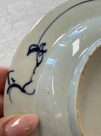 Six Chinese blue and white plates, a dish and a large tile, Yongzheng/Qianlong