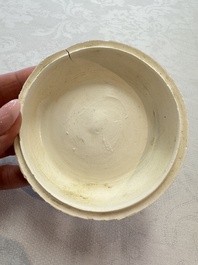 Four Chinese white-glazed boxes and covers with incised floral design from the Jepara shipwreck, Dehua or Anxi kiln, Song