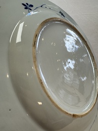 Six Chinese blue and white plates, a dish and a large tile, Yongzheng/Qianlong