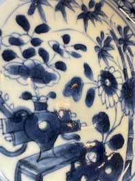 Six Chinese blue and white plates, a dish and a large tile, Yongzheng/Qianlong