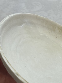 Four Chinese white-glazed boxes and covers with incised floral design from the Jepara shipwreck, Dehua or Anxi kiln, Song