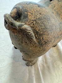 A Javanese terracotta boar-shaped money bank, probably Majapahit Kingdom, 15th C.