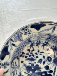 Six Chinese blue and white plates, a dish and a large tile, Yongzheng/Qianlong