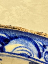 A Persian blue, white, and green glazed dish with stylised floral design, Safavid, 17/18th C.
