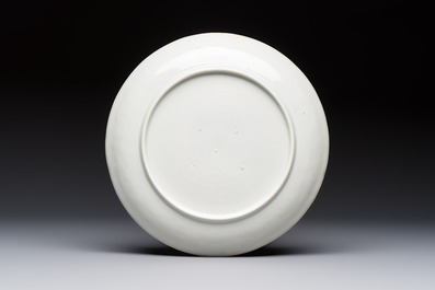 A Japanese Arita blue and white Kakiemon-style 'Kirin' plate with underglaze relief design, Edo, 18th C.