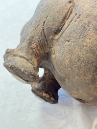 A Javanese terracotta boar-shaped money bank, probably Majapahit Kingdom, 15th C.