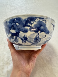 A Chinese blue and white bowl with scholars among cranes and deer, Kangxi mark and of the period