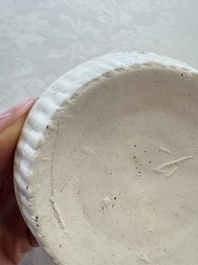 Four Chinese white-glazed boxes and covers with incised floral design from the Jepara shipwreck, Dehua or Anxi kiln, Song
