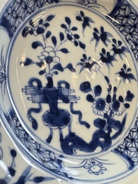 Six Chinese blue and white plates, a dish and a large tile, Yongzheng/Qianlong