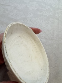 Four Chinese white-glazed boxes and covers with incised floral design from the Jepara shipwreck, Dehua or Anxi kiln, Song