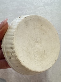 Four Chinese white-glazed boxes and covers with incised floral design from the Jepara shipwreck, Dehua or Anxi kiln, Song