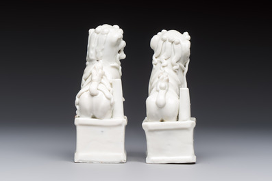 Two Chinese Dehua blanc-de-Chine Buddhist lions, three famille rose figures, and a white-glazed group, Kangxi and later