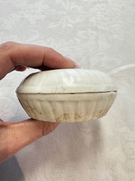 Four Chinese white-glazed boxes and covers with incised floral design from the Jepara shipwreck, Dehua or Anxi kiln, Song