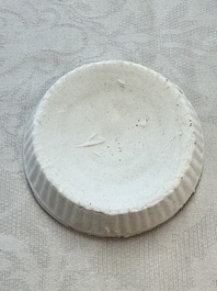 Four Chinese white-glazed boxes and covers with incised floral design from the Jepara shipwreck, Dehua or Anxi kiln, Song