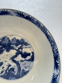 A Chinese blue and white bowl with scholars among cranes and deer, Kangxi mark and of the period