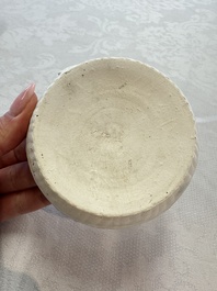 Four Chinese white-glazed boxes and covers with incised floral design from the Jepara shipwreck, Dehua or Anxi kiln, Song