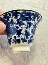 Four Chinese blue and white 'Bleu de Hue' cups and two bowls, various marks, 19th C.