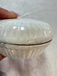 Four Chinese white-glazed boxes and covers with incised floral design from the Jepara shipwreck, Dehua or Anxi kiln, Song