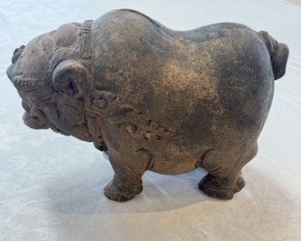 A Javanese terracotta boar-shaped money bank, probably Majapahit Kingdom, 15th C.