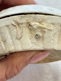 Four Chinese white-glazed boxes and covers with incised floral design from the Jepara shipwreck, Dehua or Anxi kiln, Song