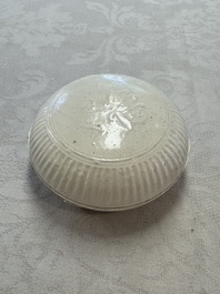 Four Chinese white-glazed boxes and covers with incised floral design from the Jepara shipwreck, Dehua or Anxi kiln, Song
