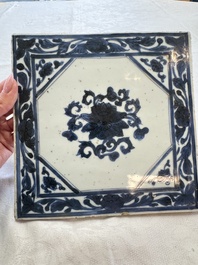 Six Chinese blue and white plates, a dish and a large tile, Yongzheng/Qianlong
