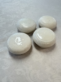 Four Chinese white-glazed boxes and covers with incised floral design from the Jepara shipwreck, Dehua or Anxi kiln, Song