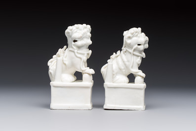 Two Chinese Dehua blanc-de-Chine Buddhist lions, three famille rose figures, and a white-glazed group, Kangxi and later