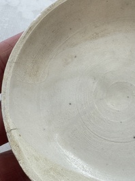 Four Chinese white-glazed boxes and covers with incised floral design from the Jepara shipwreck, Dehua or Anxi kiln, Song