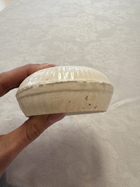 Four Chinese white-glazed boxes and covers with incised floral design from the Jepara shipwreck, Dehua or Anxi kiln, Song