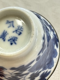 Four Chinese blue and white 'Bleu de Hue' cups and two bowls, various marks, 19th C.