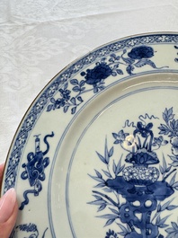 Six Chinese blue and white plates, a dish and a large tile, Yongzheng/Qianlong