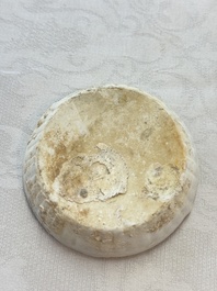 Four Chinese white-glazed boxes and covers with incised floral design from the Jepara shipwreck, Dehua or Anxi kiln, Song