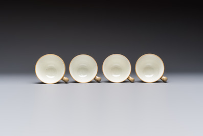 A 24-piece English Spode mocha-ground and gilt coffee and tea service, 19th C.