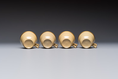 A 24-piece English Spode mocha-ground and gilt coffee and tea service, 19th C.