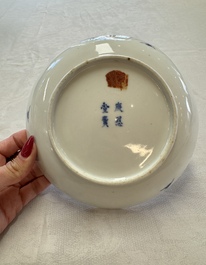 A pair of Chinese blue and white 'Bleu de Hue' plates with lotus design, Phi Khanh An Duong 慶恩堂費 mark, 19th C.