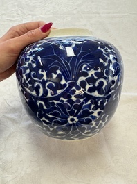 A pair of Chinese blue and white 'Lotus Scroll' jars, 19th C.