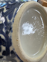 A pair of Chinese blue and white 'Lotus Scroll' jars, 19th C.