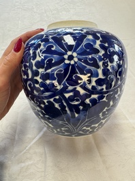 A pair of Chinese blue and white 'Lotus Scroll' jars, 19th C.