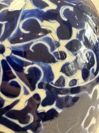 A pair of Chinese blue and white 'Lotus Scroll' jars, 19th C.