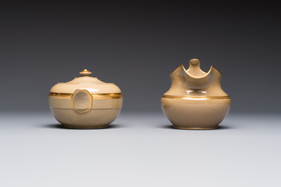 A 24-piece English Spode mocha-ground and gilt coffee and tea service, 19th C.