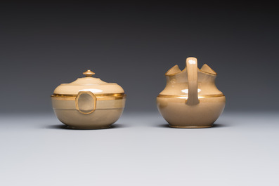 A 24-piece English Spode mocha-ground and gilt coffee and tea service, 19th C.