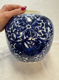 A pair of Chinese blue and white 'Lotus Scroll' jars, 19th C.